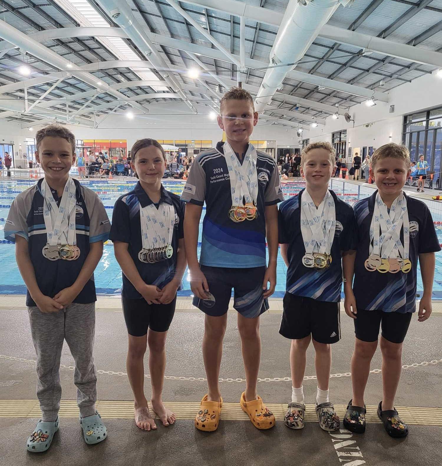 Swimming quintet earns top-four place at Orange